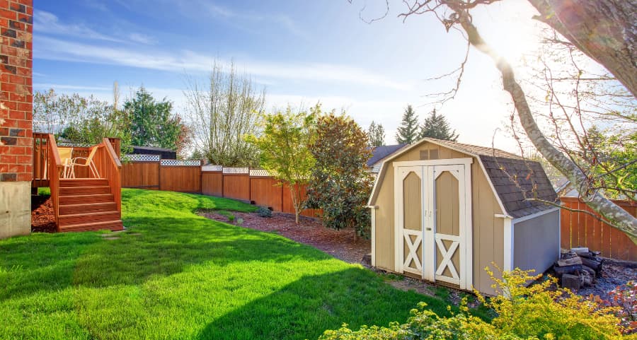 Fenced backyard with storage shed in Santa Clarita